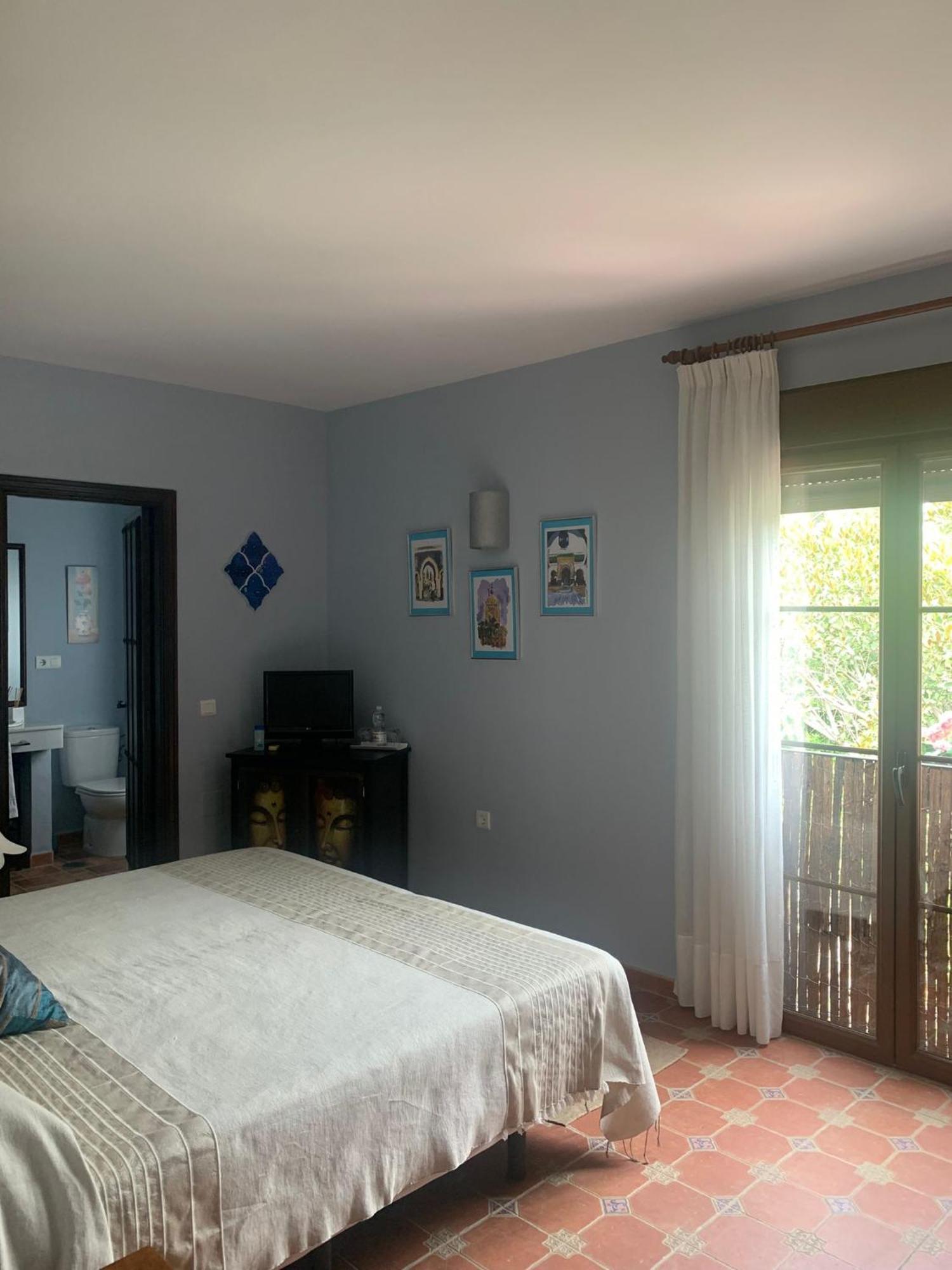 Hotel Cortijo De Salia Alcaucín Quarto foto